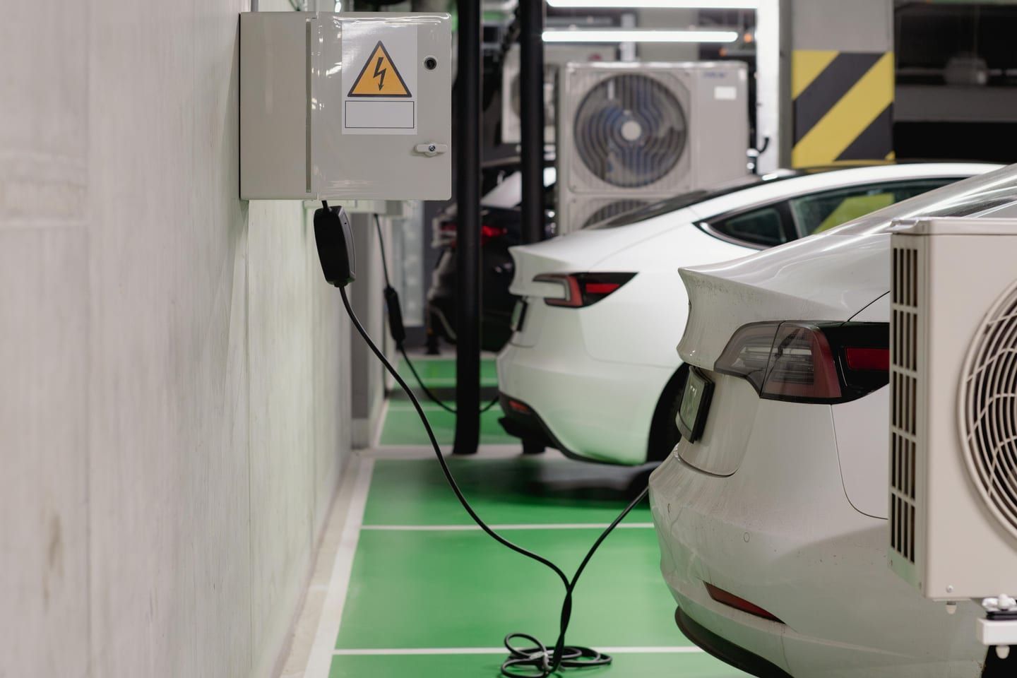 A qualifying residential Level 2 charger installed on a permitted circuit