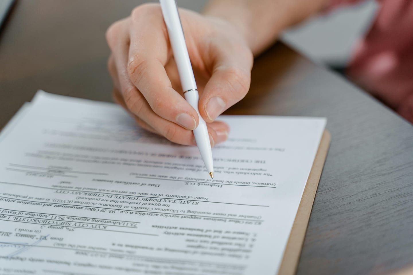 EV charger rebate paperwork with an invoice and charger model number